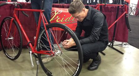 photo of curious people  IRIDE italian booth at NAHBS North American Handmade Bicycle Show urban bikes